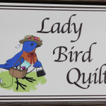 Lady Bird Quilts sign