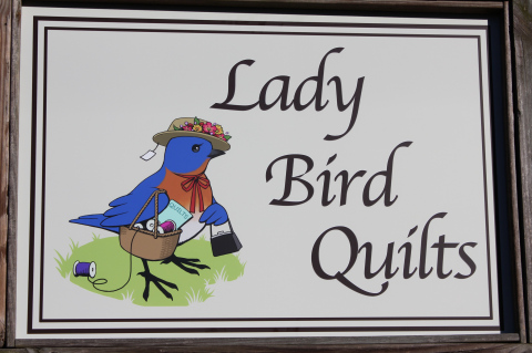 Lady Bird Quilts sign