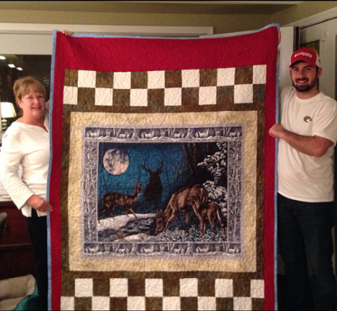 Karen and Jeffery with quilt