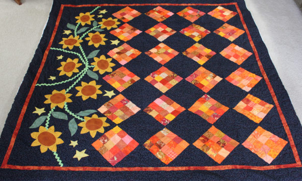 Sixteen Patch and Sunflowers Quilt