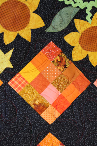 Sixteen Patch and Sunflowers Quilt