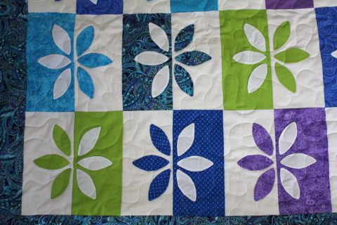 Appliqué Multicolor Petals Quilt