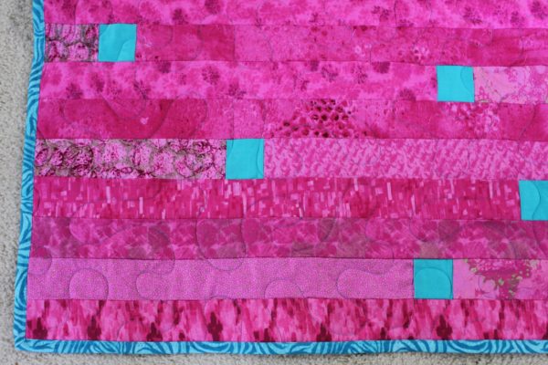 Pink and Turquoise Jelly Roll Throw