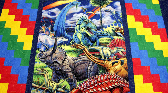 Dinosaurs and Primary Colors Brick Wall Quilt