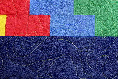 Dinosaurs and Primary Colors Brick Wall Quilt