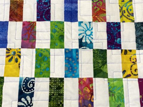 Patti’s Batik Strip Patch Quilt