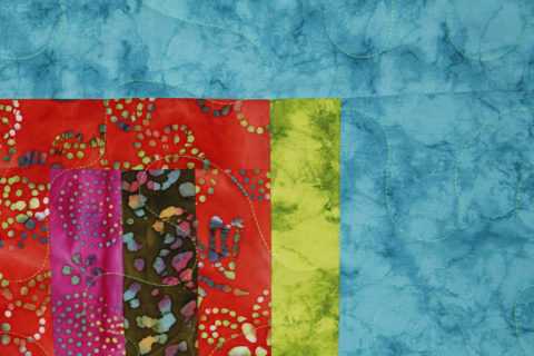 Angela’s Batik Jelly Roll Quilt