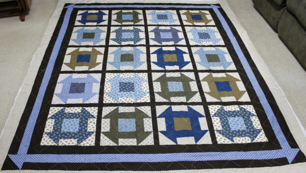 Laverne’s Brown and Blues Churn Dash Quilt