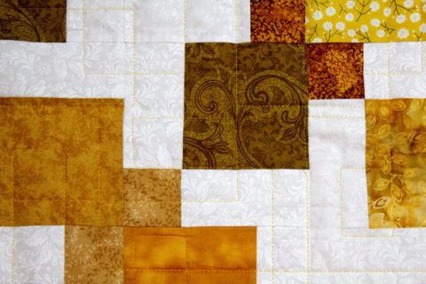 Joy’s Fall Disappearing Nine Patch Quilt