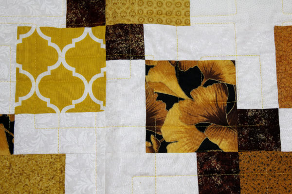 Joy’s Fall Disappearing Nine Patch Quilt