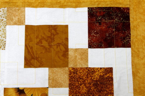 Joy’s Fall Disappearing Nine Patch Quilt