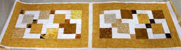 Joy’s Fall Disappearing Nine Patch Table Runner