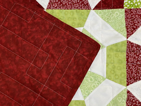 Beth’s Red & Green Geometric Quilt