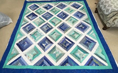 Cool Diagonal Strip Quilt by JoAnne