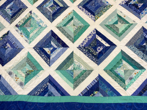 Cool Diagonal Strip Quilt by JoAnne