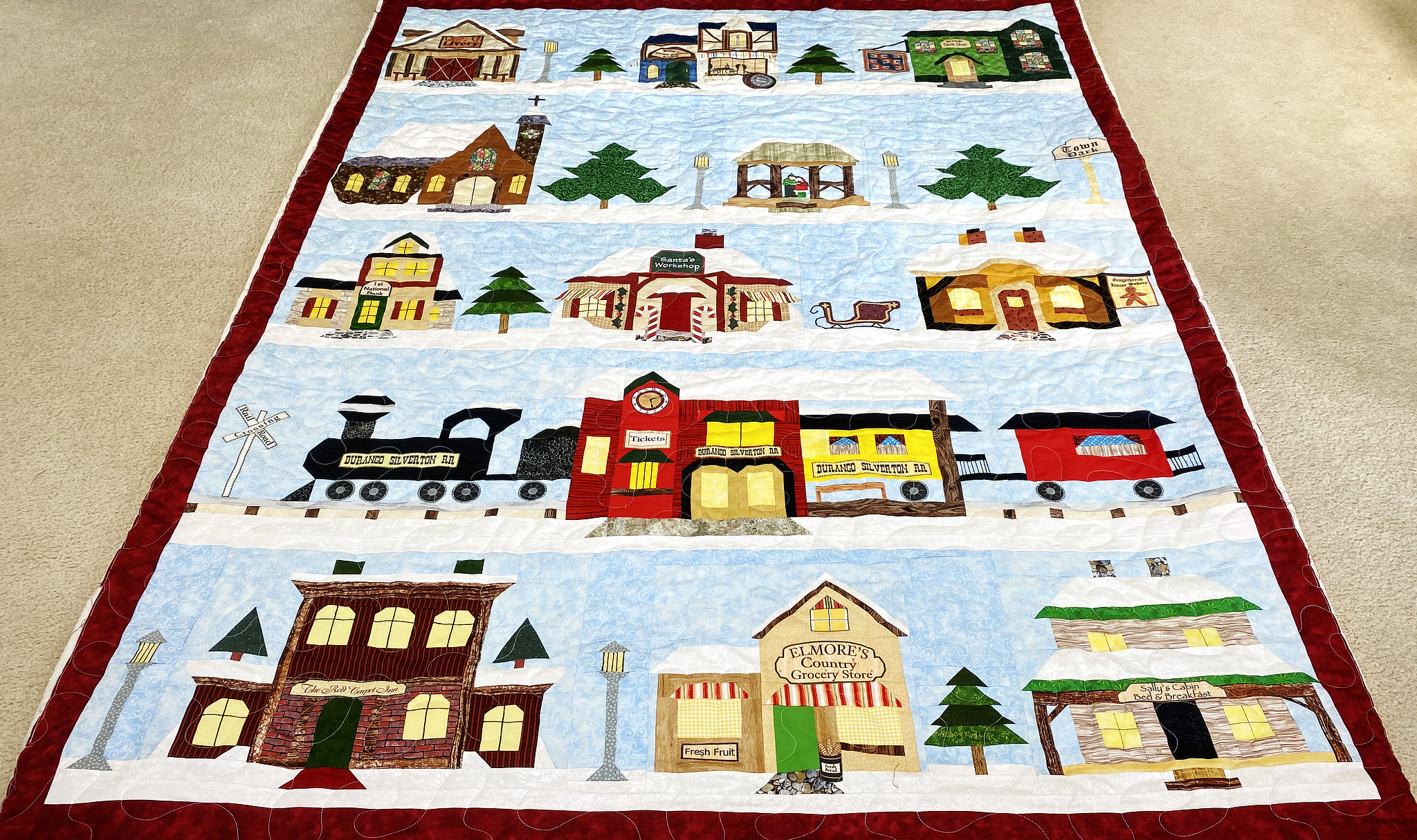 ann-s-holiday-snow-village-quilt-lady-bird-quilts