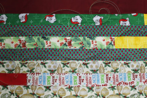 Debbie’s Christmas Strip Quilt