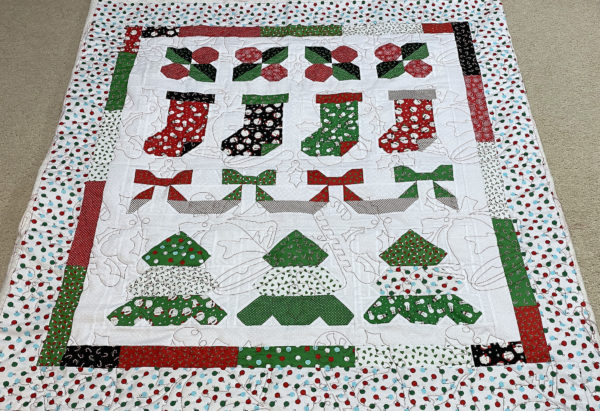 Christmas Holly, Stockings, Ribbons and Trees Throw by Jeanne