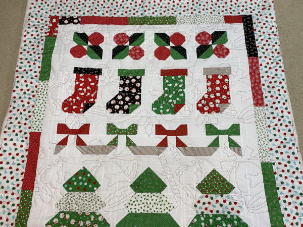 Christmas Holly, Stockings, Ribbons and Trees Throw by Jeanne