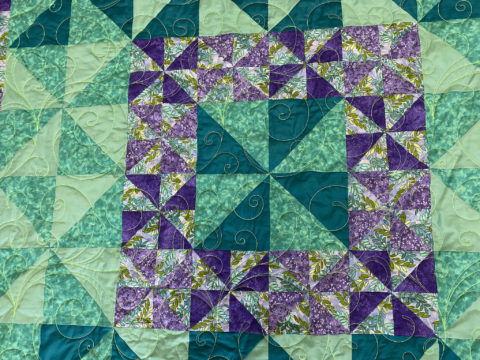 Patti’s Teal and Purple Pinwheel Quilt