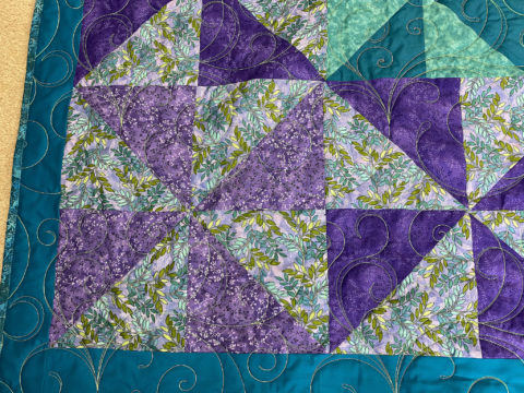 Patti’s Teal and Purple Pinwheel Quilt