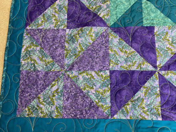 Patti’s Teal and Purple Pinwheel Quilt