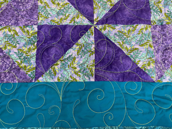 Patti’s Teal and Purple Pinwheel Quilt