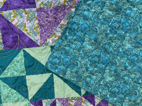 Patti’s Teal and Purple Pinwheel Quilt