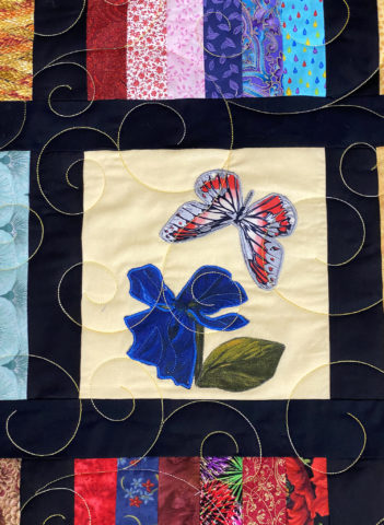 Flowers and Butterflies Strip Quilt