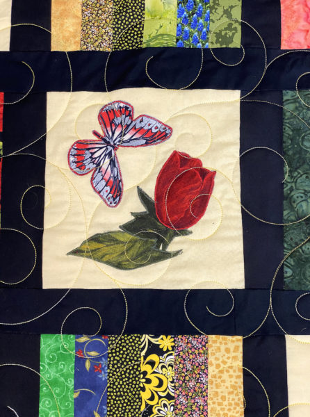 Flowers and Butterflies Strip Quilt