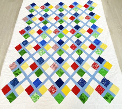 Jan’s Colorful 4 Patch Quilt