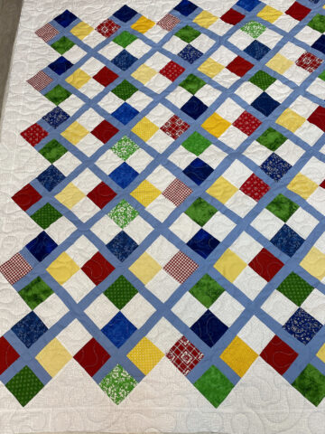 Jan’s Colorful 4 Patch Quilt