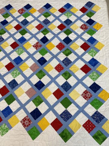 Jan’s Colorful 4 Patch Quilt