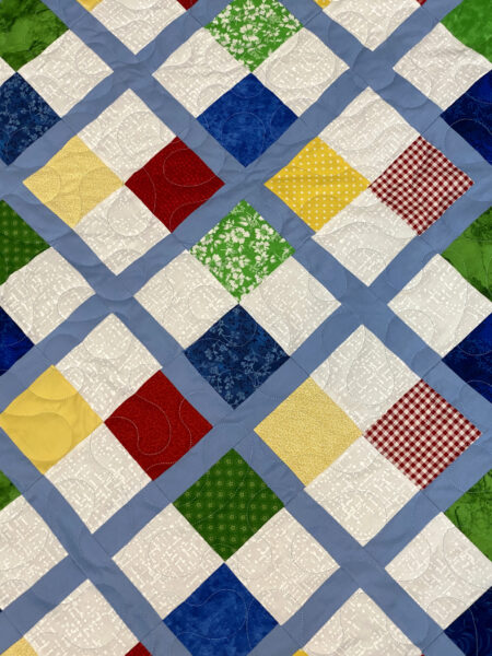 Jan’s Colorful 4 Patch Quilt