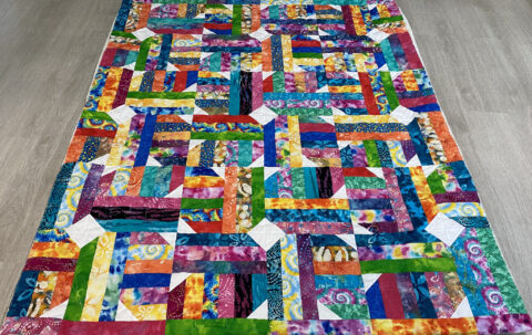 Terry’s Colorful Batik Strip Quilt