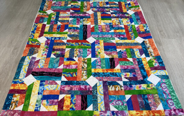 Terry’s Colorful Batik Strip Quilt
