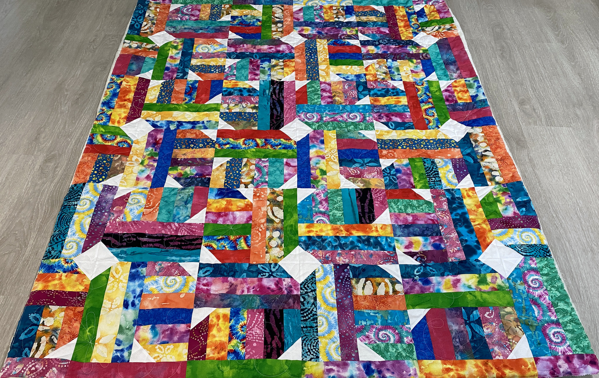 Terry’s Colorful Batik Strip Quilt