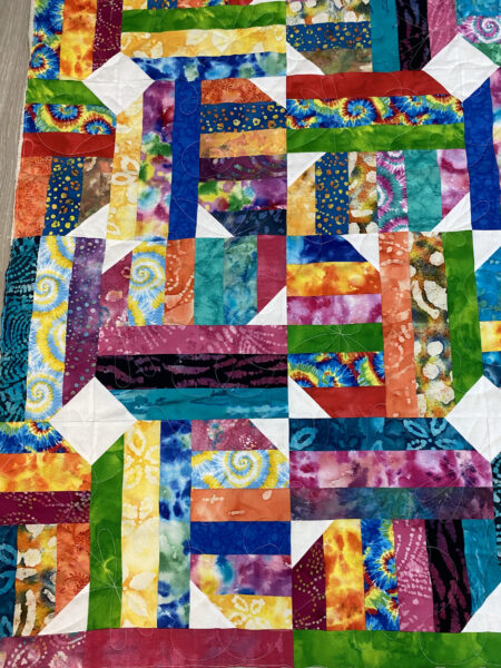 Terry’s Colorful Batik Strip Quilt