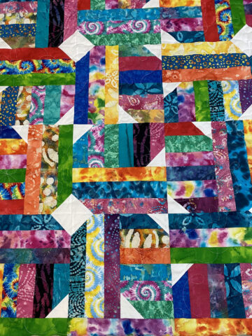 Terry’s Colorful Batik Strip Quilt
