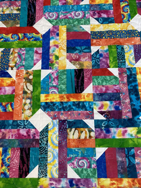 Terry’s Colorful Batik Strip Quilt