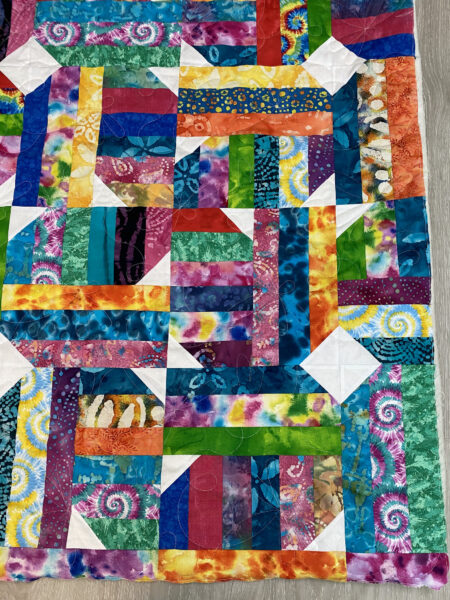 Terry’s Colorful Batik Strip Quilt