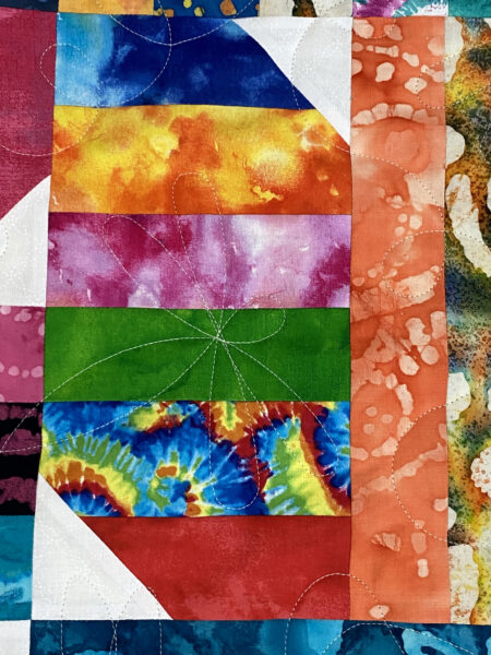 Terry’s Colorful Batik Strip Quilt