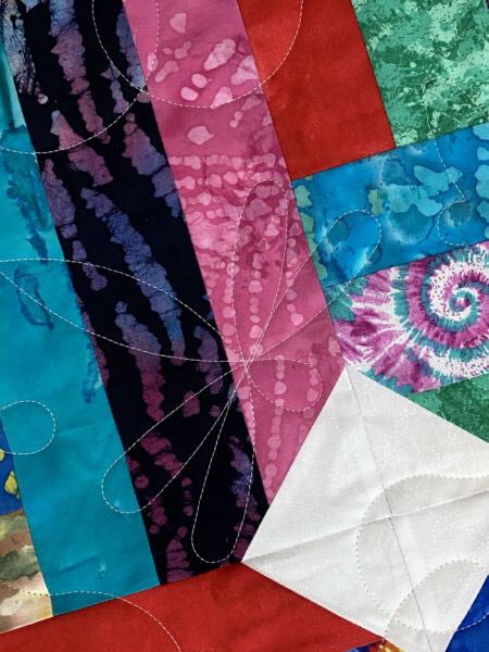 Terry’s Colorful Batik Strip Quilt
