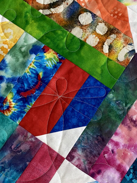 Terry’s Colorful Batik Strip Quilt