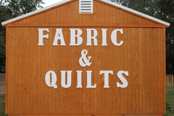 Lady Bird Quilts fabric and quilts shop sign